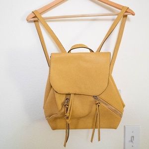Yellow, leather backpack purse